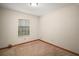 A carpeted bedroom with light colored walls and baseboards at 16318, 16250 & 16300 County Road 448, Mount Dora, FL 32757