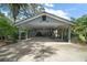 Spacious carport with room for multiple vehicles and featuring ample storage at 16318, 16250 & 16300 County Road 448, Mount Dora, FL 32757