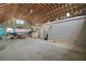 Spacious garage interior with high ceilings, boat storage and ample space for projects and equipment at 16318, 16250 & 16300 County Road 448, Mount Dora, FL 32757