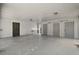 A spacious garage with three doors and an utility sink at 16318, 16250 & 16300 County Road 448, Mount Dora, FL 32757