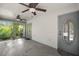 Enclosed porch with ceiling fans and view to exterior at 16318, 16250 & 16300 County Road 448, Mount Dora, FL 32757