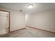 A room with light colored walls, baseboards, and access to the bathroom at 16318, 16250 & 16300 County Road 448, Mount Dora, FL 32757
