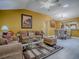 Open-concept living area featuring a view of the dining area and kitchen at 1675 Westminster Ct, The Villages, FL 32162