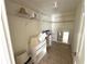 Walk-in closet with shelves, drawers and mirror at 17483 Se 74Th Netherclift Ter, The Villages, FL 32162