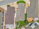 Bird's-eye view shows roof and landscaping, surrounded by the other homes in this community at 17695 Se 84Th Peyton Ct, The Villages, FL 32162