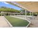 Covered bocce ball courts offer a recreational space in the active community at 17695 Se 84Th Peyton Ct, The Villages, FL 32162