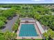 Aerial view of the community pool, features dedicated lap lanes and plenty of space to relax at 17695 Se 84Th Peyton Ct, The Villages, FL 32162