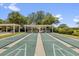 Mulberry Grove Recreation Center features covered shuffleboard courts and seating at 17695 Se 84Th Peyton Ct, The Villages, FL 32162