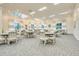 Spacious dining area with large windows and stylish decor at 1990 Wallingford Loop, Mount Dora, FL 32757