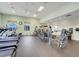Well-equipped gym with treadmills, ellipticals, and weight machines offers residents a convenient fitness option at 1990 Wallingford Loop, Mount Dora, FL 32757