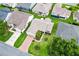 Aerial view showcasing a beautiful home, landscaped yard, and inviting curb appeal at 2017 Palo Alto Ave, The Villages, FL 32159
