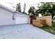 Home featuring a spacious driveway and an attached single car garage at 212 Blossom Ln, Winter Park, FL 32789