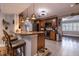 Bright kitchen with granite countertops, stainless steel appliances, and patterned tile flooring at 212 Blossom Ln, Winter Park, FL 32789