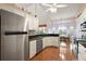 Spacious kitchen with stainless steel appliances, granite countertops, and ample cabinet space at 26034 Oakmount Dr, Leesburg, FL 34748