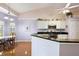 Kitchen with stainless steel appliances, granite countertops, and a breakfast nook at 26034 Oakmount Dr, Leesburg, FL 34748