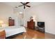 Spacious main bedroom features hardwood flooring and lots of storage at 26034 Oakmount Dr, Leesburg, FL 34748