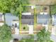 Aerial view showcasing the property's layout, including the roof, driveway, and surrounding greenery, in a well-established neighborhood at 2743 Nattie Ct, Orlando, FL 32826