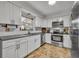 Well-appointed kitchen featuring stainless steel appliances, sleek countertops, and ample storage at 2743 Nattie Ct, Orlando, FL 32826