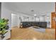 Spacious living room featuring hardwood floors, a comfortable seating area, and natural light at 2743 Nattie Ct, Orlando, FL 32826