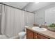 Bathroom with vanity, mirror and shower/tub combination at 2849 Doe Run Trl, Orange City, FL 32763