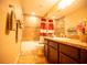 Bathroom with bathtub, shower, toilet and vanity with sink at 29222 Can Do Ln, Tavares, FL 32778