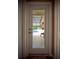 Door view that shows an inviting pool and lanai area with serene outdoor lounging at 29222 Can Do Ln, Tavares, FL 32778