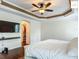 Spacious primary bedroom featuring a ceiling fan and walk-in closet at 2994 Adrienne Way, The Villages, FL 32163