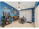 Bright kitchen with a decorative display shelf, modern appliances, and a breakfast bar at 3015 Casselwood St, Winter Park, FL 32792