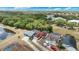 Aerial view of a residential neighborhood, showcasing a cozy home with screened patio at 3016 Bloomsbury Dr, Kissimmee, FL 34747