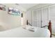 Bright bedroom featuring a TV, closet space, and comfortable bed at 3016 Bloomsbury Dr, Kissimmee, FL 34747