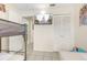 Bedroom offering a bunk bed, tile floors and TV at 3016 Bloomsbury Dr, Kissimmee, FL 34747