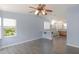 Bright bedroom with bay window and updated flooring, plus vanity and sink area at 31636 Gladys Ln, Tavares, FL 32778