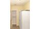 Hallway features built in shelves and storage cabinet at 31636 Gladys Ln, Tavares, FL 32778