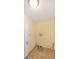 The laundry room has neutral walls and wood-look floors; ready for your washer and dryer at 31636 Gladys Ln, Tavares, FL 32778