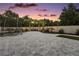 Large backyard with pavers, a trampoline, and plenty of space for outdoor activities at 318 Stone Castle Loop, Lady Lake, FL 32159