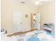 Bright and airy bedroom featuring wood floors and multiple doorways at 32025 Timberlake Dr, Mount Dora, FL 32757