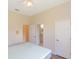 Bedroom with a view of the bathroom and other rooms through the open doors at 32025 Timberlake Dr, Mount Dora, FL 32757
