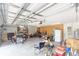 Spacious garage with ample storage, overhead lighting, and an open layout at 32025 Timberlake Dr, Mount Dora, FL 32757