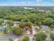 Aerial view highlighting the home's location near lush green spaces and local amenities at 3904 Valencia Grove Ln, Orlando, FL 32817