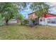 Beautiful backyard with a cozy porch swing, creating a relaxing and inviting outdoor retreat at 3904 Valencia Grove Ln, Orlando, FL 32817