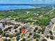 Aerial view showcases the property's location near Lake Monroe and major roadways, surrounded by lush greenery at 428 Coventry Estates Blvd, Deltona, FL 32725