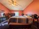 Bedroom with a ceiling fan, bed, window, and other furniture at 428 Coventry Estates Blvd, Deltona, FL 32725