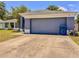 Attractive single-story home with a gray two-car garage and an inviting exterior at 428 Coventry Estates Blvd, Deltona, FL 32725