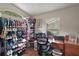 Well-organized office space with a desk, chair, storage, and natural light at 4300 Leafway Cir, Leesburg, FL 34748