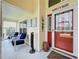 Cozy front porch featuring stylish seating and a decorative welcome sign at 4520 Eaglewood Dr, Leesburg, FL 34748