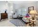 Cozy living room featuring stylish furniture, nautical accents, and ample natural light at 4520 Eaglewood Dr, Leesburg, FL 34748