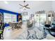 Cozy living room boasts natural light, comfortable seating, stylish decor, and an open floor plan at 4520 Eaglewood Dr, Leesburg, FL 34748