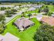 Property showcasing landscaping, cul-de-sac, & screened lanai at 5620 Illumination Ln, Leesburg, FL 34748