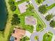 Aerial view of the home showcasing its location, large yard, and neighborhood layout at 5620 Illumination Ln, Leesburg, FL 34748