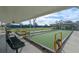 View of the community bocce ball courts with covered seating for residents to relax and watch the game at 5620 Illumination Ln, Leesburg, FL 34748